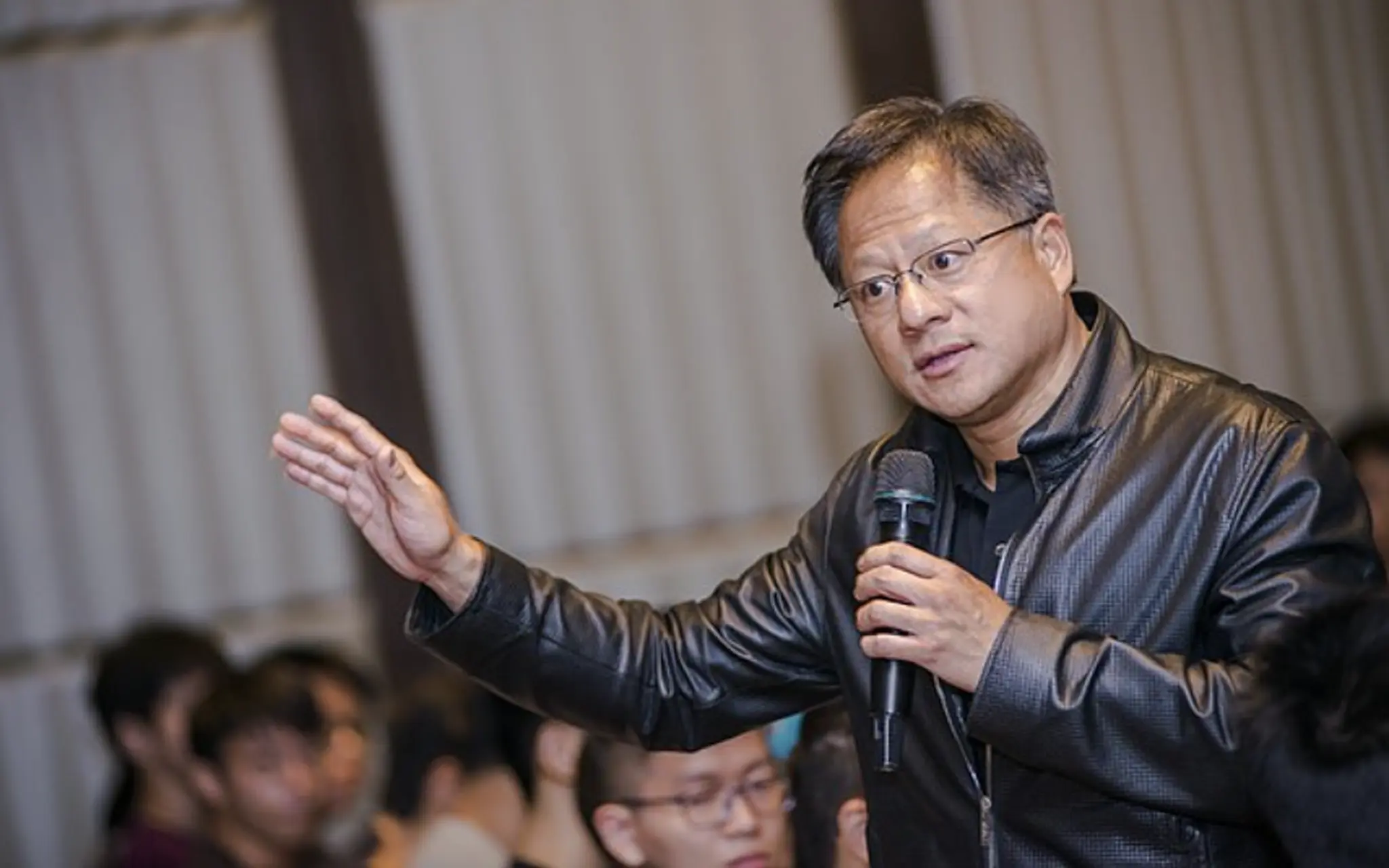 Jensen Huang, who says it's "illogical" AI replaces software